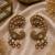 Gold plated ruby red peacock motif statement earrings