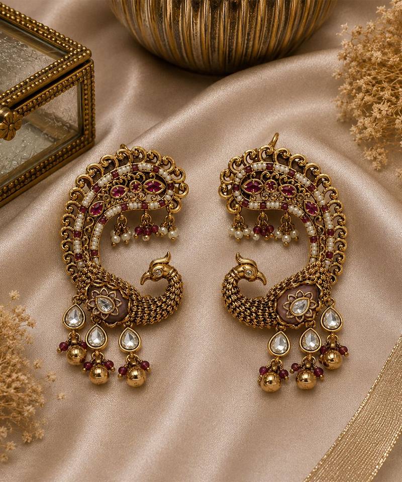 Gold plated ruby red peacock motif statement earrings