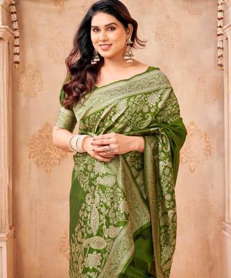 Green silk blend zari woven woven saree 1