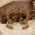 Gold plated multicolor peacock motif statement earrings