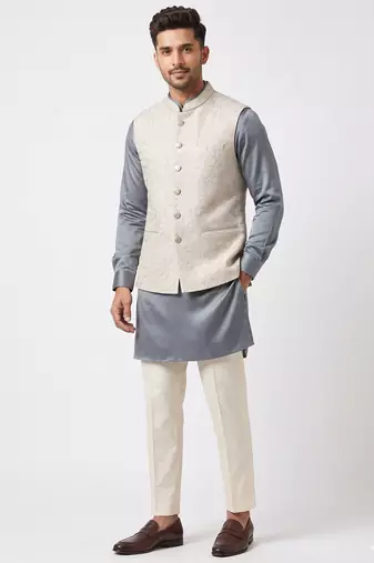 A loyal white cutdana embroidered nehru jacket