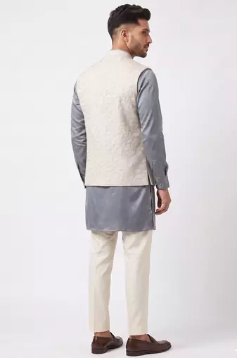 A loyal white cutdana embroidered nehru jacket