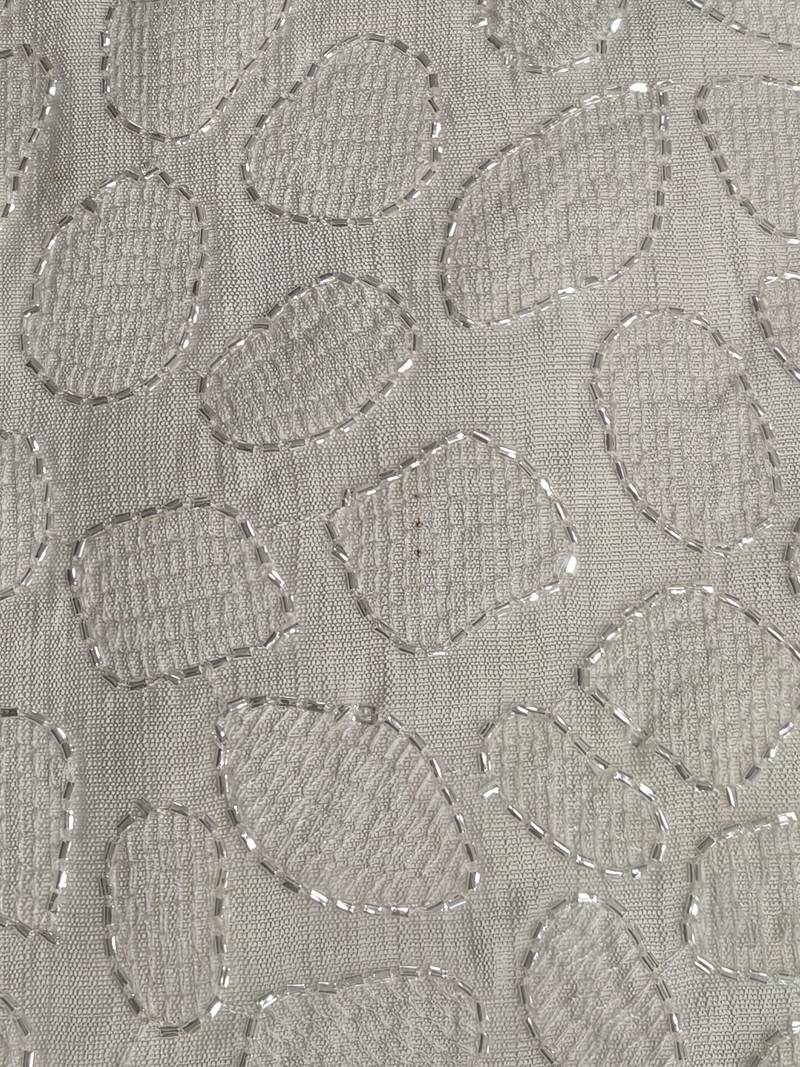 A loyal white cutdana embroidered nehru jacket