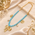 Anti-Tarnish Golden Butterfly Charm Neck Chain with Sky Blue Beads and Elegant Crystal Accents