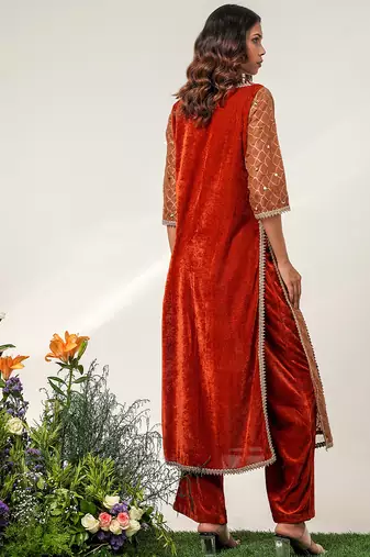 Golden and rust embroidered tissue velvet kurta pant set