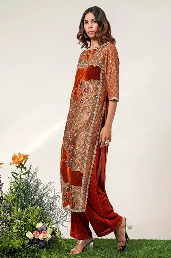 Golden and rust embroidered tissue velvet kurta pant set