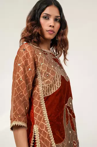 Golden and rust embroidered tissue velvet kurta pant set