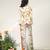 Ivory and tangerine printed crepe and nysha silk blazer and pant set