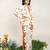 Ivory and tangerine printed crepe and nysha silk blazer and pant set