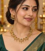 traditional chaand motif necklace set with pearl drops
