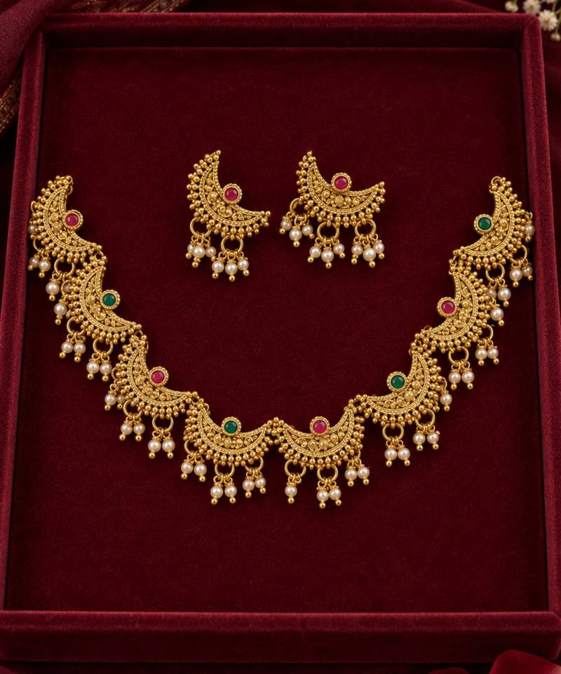 traditional chaand motif necklace set with pearl drops