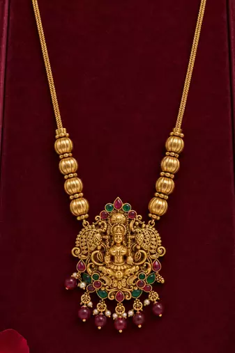traditional gold-tone lakshmi pendant necklace with multicolour stone
