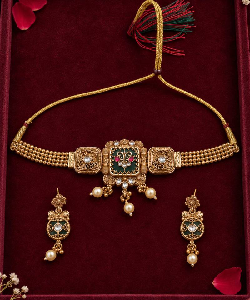 antique gold-tone necklace set with green enamel pendant