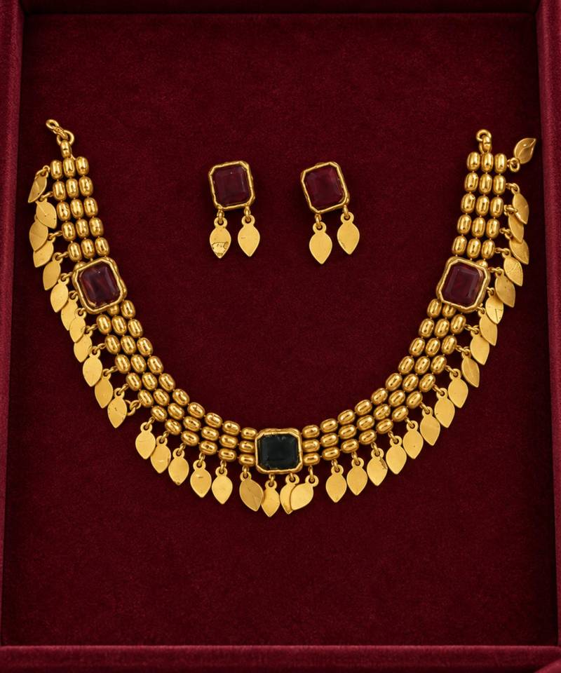 gold necklace with multicolor stone accents