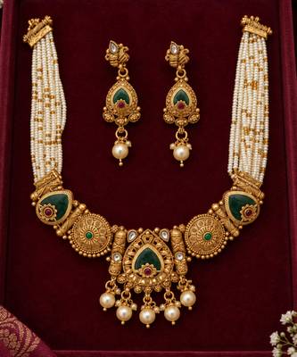 gold necklace with multistrand white beads 2