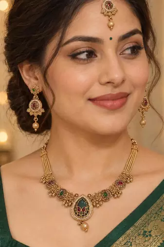 gold heritage necklace with floral pendant