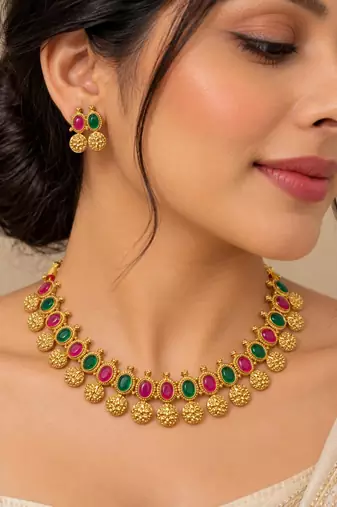 gold-tone necklace set with multicolour stone embellishments