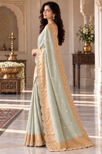 Light-sea-green silk embroidered saree withcutdana work