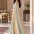 Light-sea-green silk embroidered saree withcutdana work