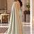 Light-sea-green silk embroidered saree withcutdana work