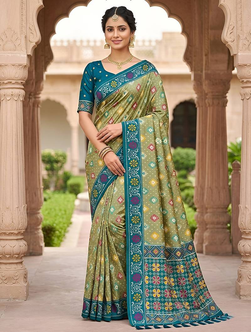 traditional green zari weaving border tassel pallu silk blend saree