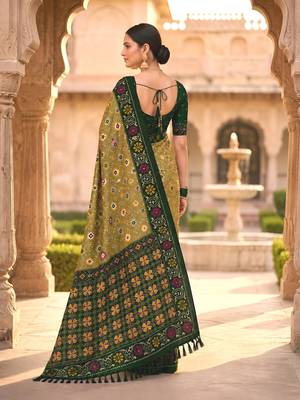 traditional mehendi green zari weaving border tassel pallu silk blend saree 4