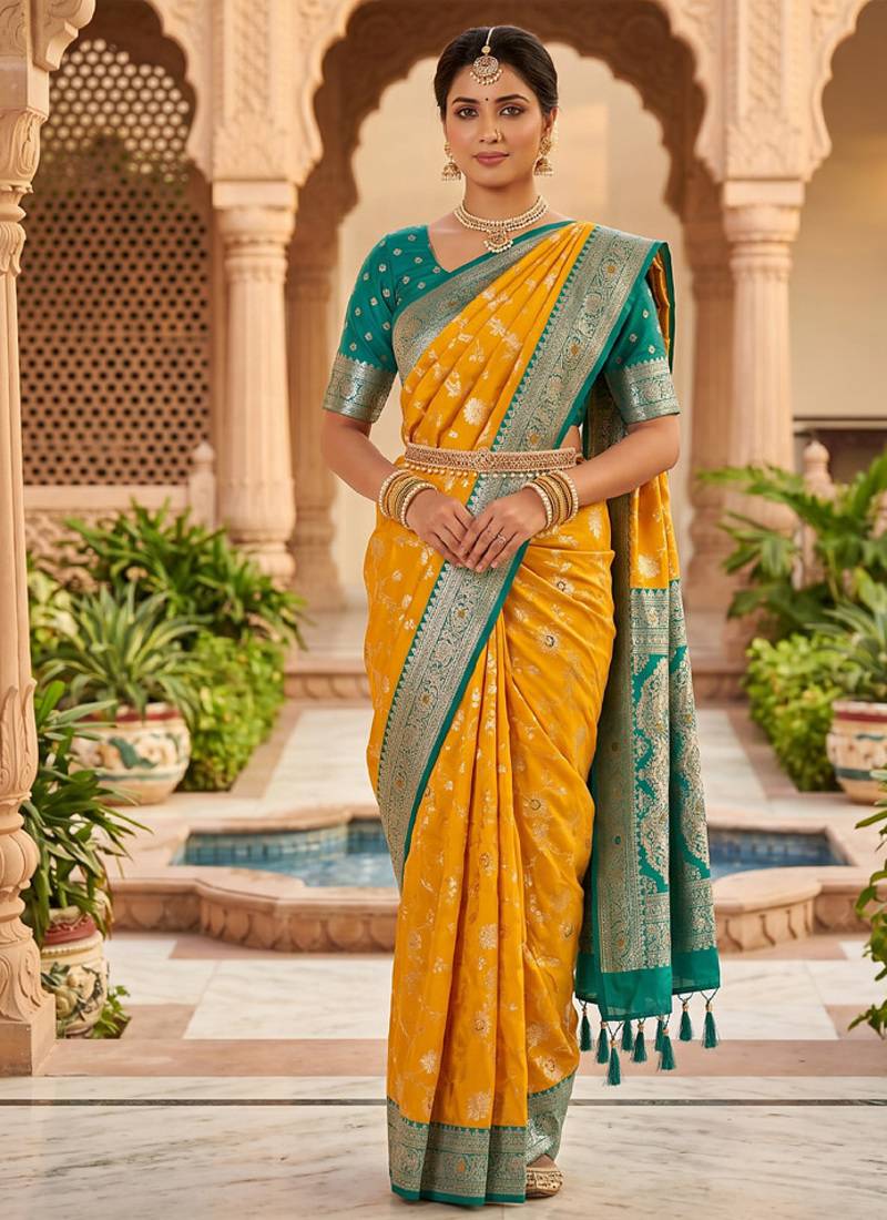 designer yellow zari weaving meenakari tassel pallu work silk blend saree