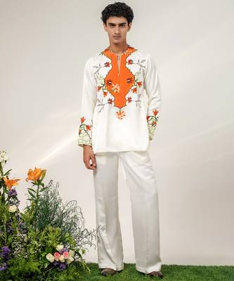 Ivory and tangerine orange printed nysha silk short kurta and pant set 1