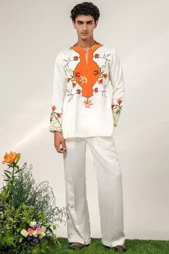 Ivory and tangerine orange printed nysha silk short kurta and pant set