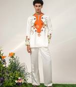 Ivory and tangerine orange printed nysha silk short kurta and pant set