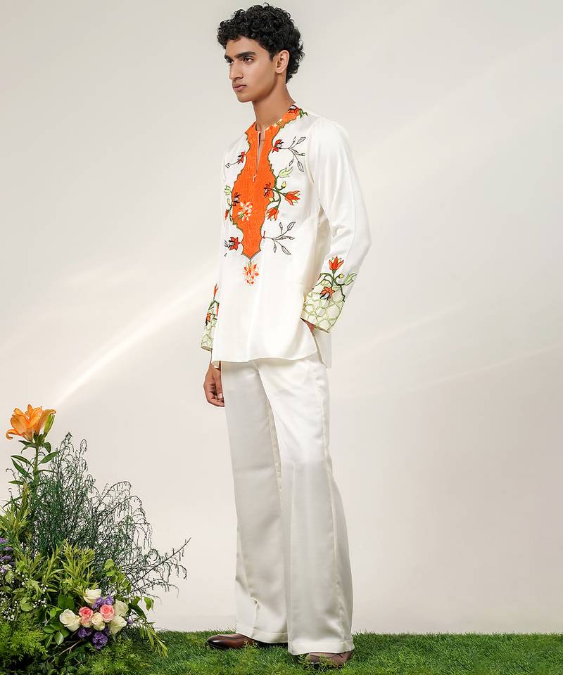 Ivory and tangerine orange printed nysha silk short kurta and pant set