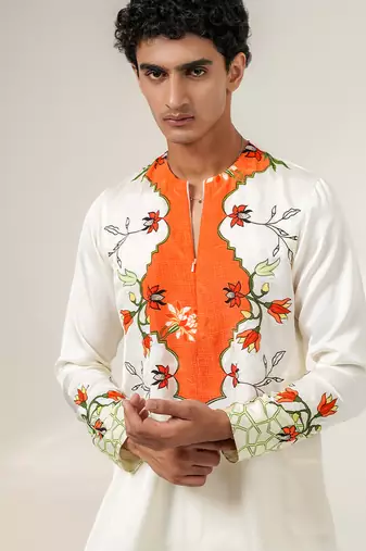 Ivory and tangerine orange printed nysha silk short kurta and pant set