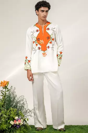 Ivory and tangerine orange printed nysha silk short kurta and pant set