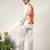 Ivory and tangerine orange printed nysha silk bandhgala with kurta and pant set