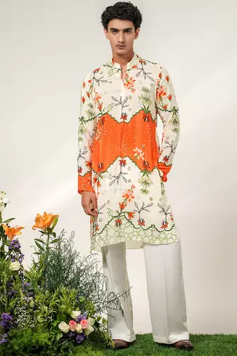 Ivory and tangerine ornage printed crepe and nysha silk kurta and pant set