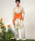 Ivory and tangerine ornage printed crepe and nysha silk kurta and pant set