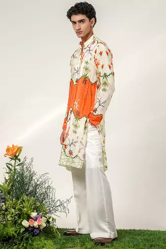 Ivory and tangerine ornage printed crepe and nysha silk kurta and pant set
