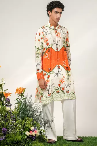 Ivory and tangerine ornage printed crepe and nysha silk kurta and pant set