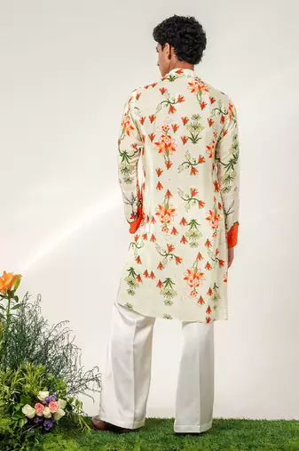 Ivory and tangerine ornage printed crepe and nysha silk kurta and pant set