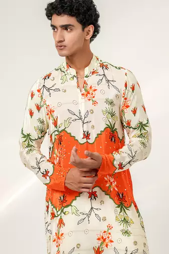 Ivory and tangerine ornage printed crepe and nysha silk kurta and pant set