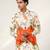 Ivory and tangerine ornage printed crepe and nysha silk kurta and pant set