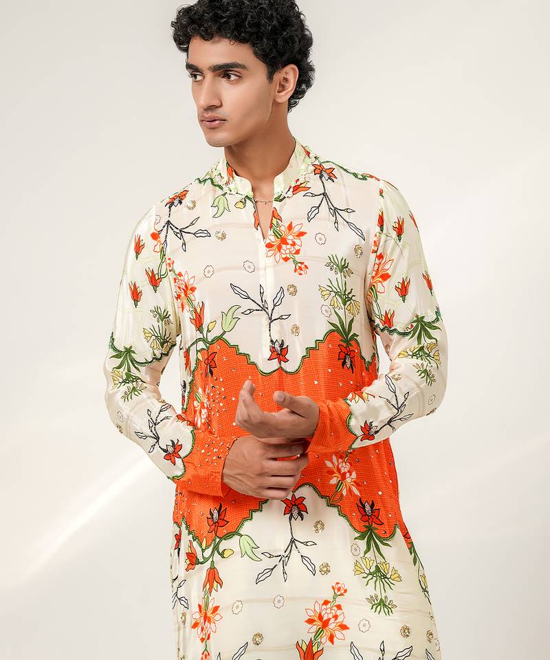 Ivory and tangerine ornage printed crepe and nysha silk kurta and pant set