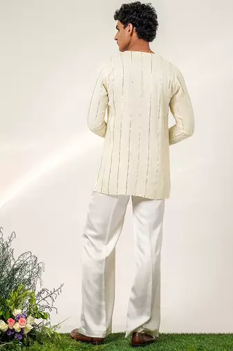 Ivory embroidered georgette and nysha silk kurta and pant set
