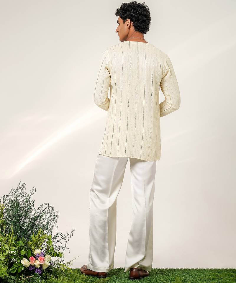 Ivory embroidered georgette and nysha silk kurta and pant set