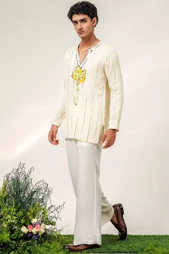 Ivory embroidered georgette and nysha silk kurta and pant set