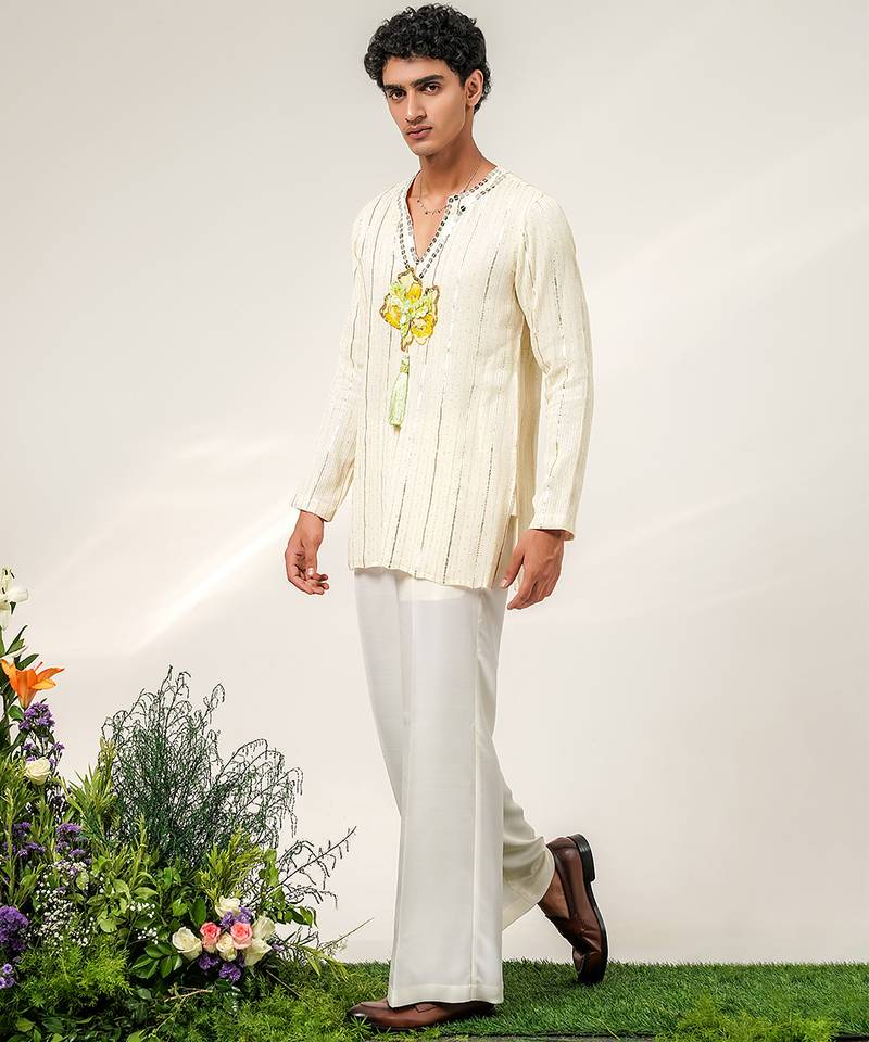 Ivory embroidered georgette and nysha silk kurta and pant set