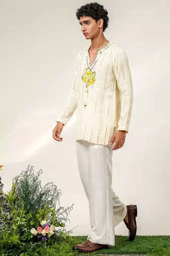 Ivory embroidered georgette and nysha silk kurta and pant set