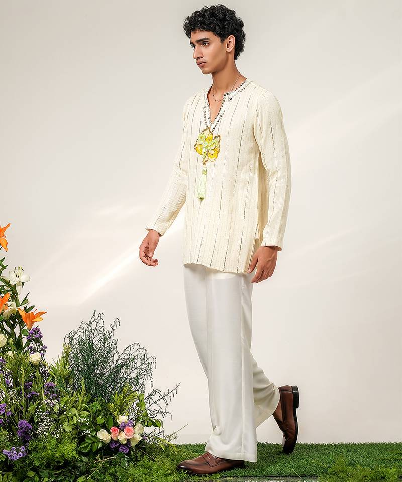 Ivory embroidered georgette and nysha silk kurta and pant set
