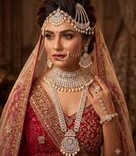 White 2-layer bridal jewelry set with earrings, maang tikka, pasha, nath & panja gold plated