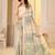 Womens elegant cream and green cotton silk saree with golden zari border, pallu with blouse